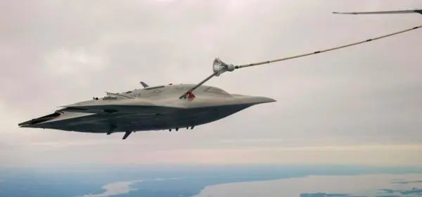 X-47B combat drone taking fuel from an Omega Aerial Refueler off the coast of Maryland.